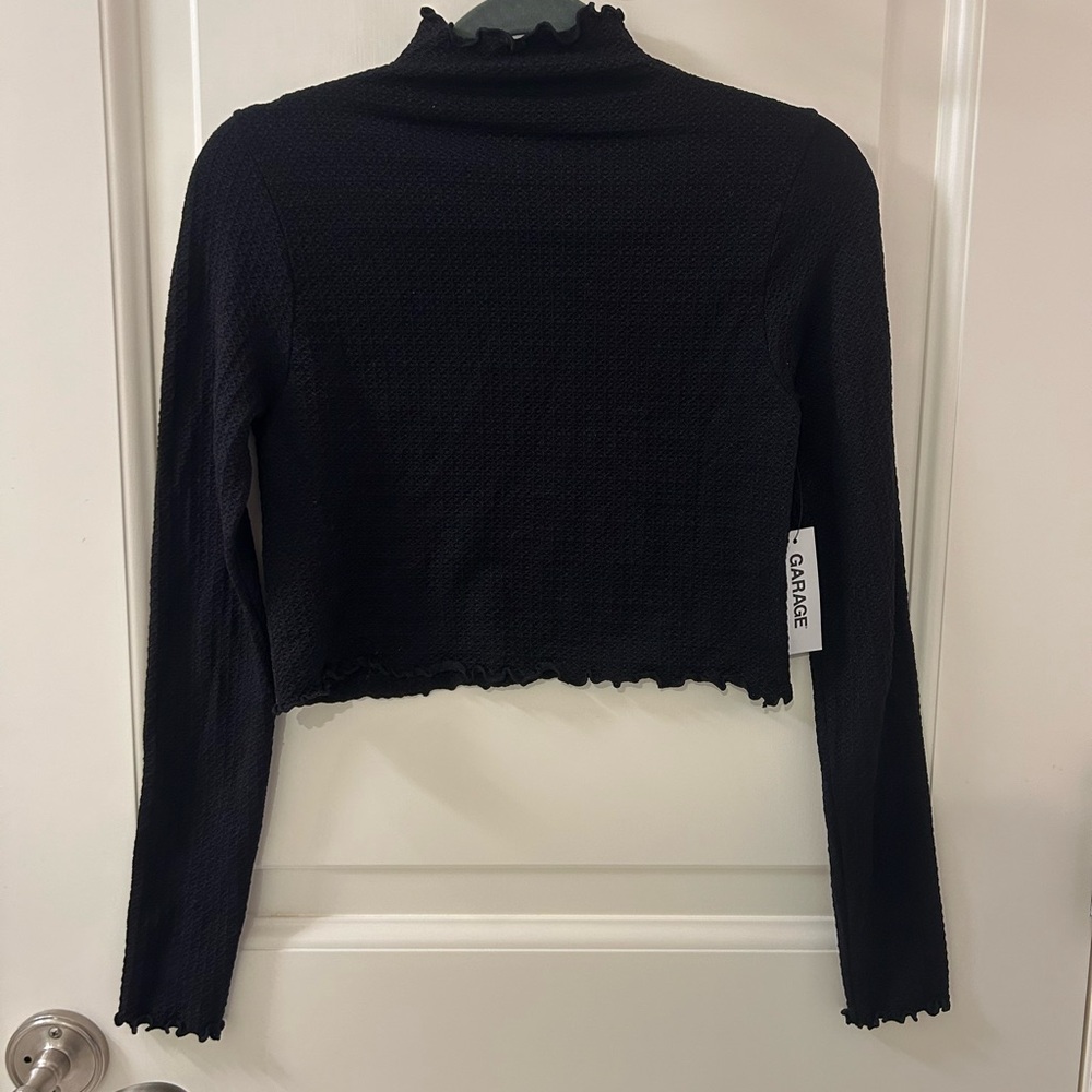 Garage Black textured  Long Sleeve Top with lettuce trim.